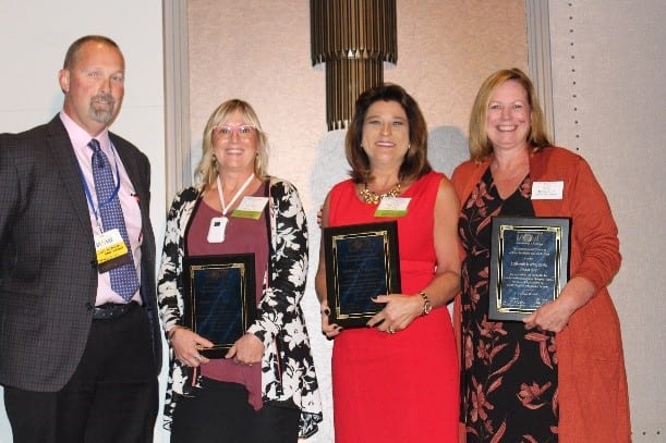 IAOMT members accepting the certification awards for the Biological Dental Hygiene Accreditation Program